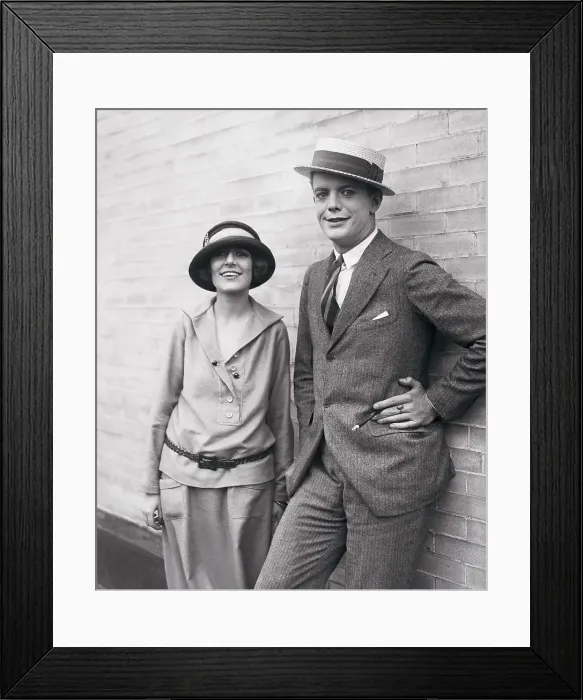 Framed Print : Couple Posing Against Wall Framed Print : Couple Posing Against Wall