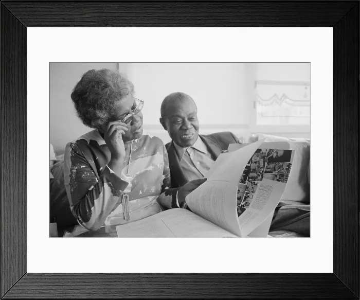 Framed Print : Mr. and Mrs. Louis Armstrong Gazing at Scrapbook at Home Framed Print : Mr. and Mrs. Louis Armstrong Gazing at Scrapbook at Home