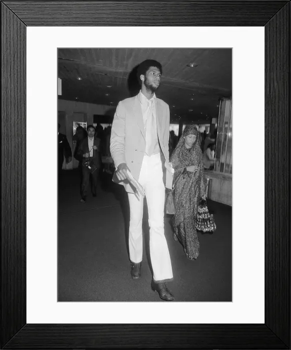 Framed Print : Kareem Abdul-Jabbar and Wife in Airport Framed Print : Kareem Abdul-Jabbar and Wife in Airport