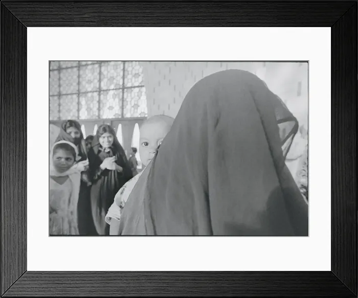 Framed Print : Pakistani Mother Carrying Baby Framed Print : Pakistani Mother Carrying Baby