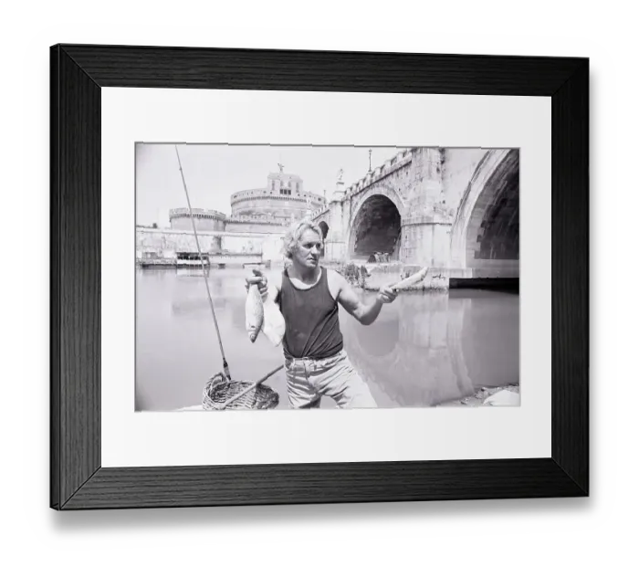 Framed Print : Man Holds Dead Fish; Italian River Framed Print : Man Holds Dead Fish; Italian River