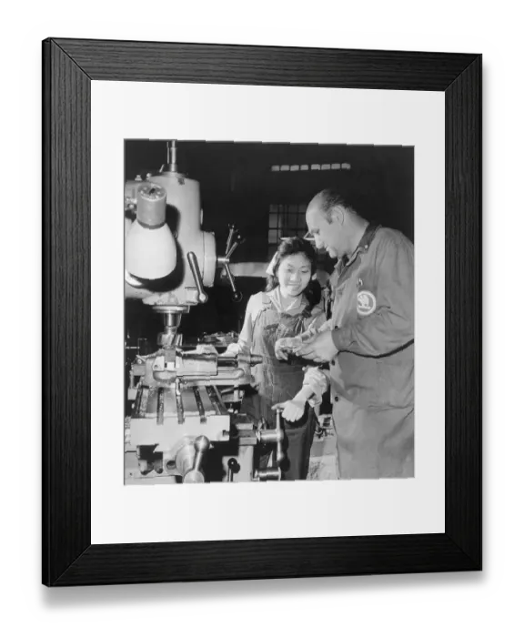 Framed Print : Foreman Instructing Vietnamese Woman Framed Print : Foreman Instructing Vietnamese Woman