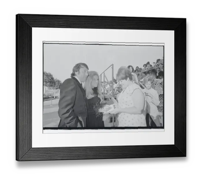 Framed Print : Meredith McRae and Husband Signing Autographs Framed Print : Meredith McRae and Husband Signing Autographs
