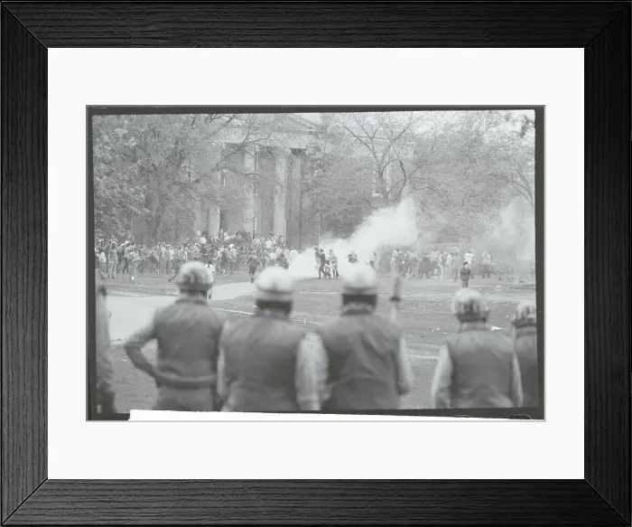 Framed Print : Police Moving in on Protesters