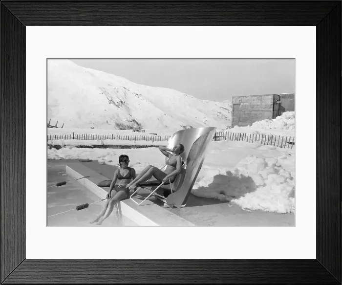 Framed Print : Woman Tanning in Sunbed Chair Framed Print : Woman Tanning in Sunbed Chair
