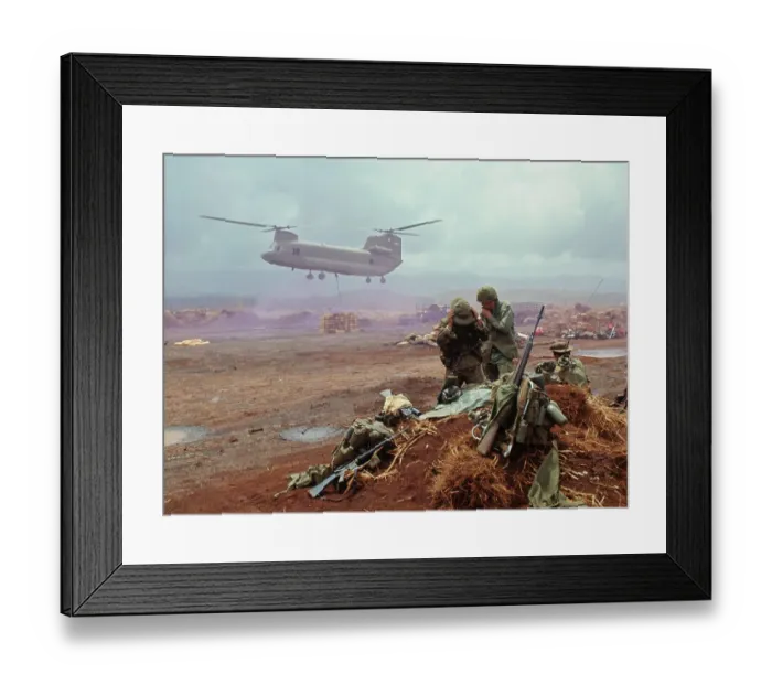 Framed Print : Army Helicopter Lowering Supplies at Vietnam Air Field Framed Print : Army Helicopter Lowering Supplies at Vietnam Air Field