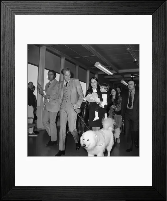 Framed Print : David Harris and Joan Baez Walk with Son