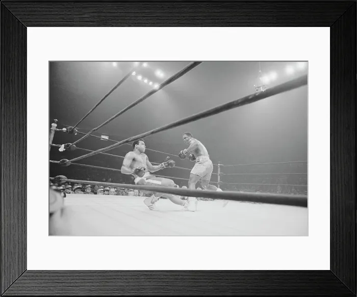 Framed Print : Boxer Joe Frazier Knocking Out Mohammad Ali Framed Print : Boxer Joe Frazier Knocking Out Mohammad Ali