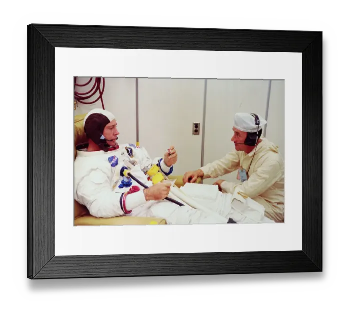 Framed Print : Space Technician Conversing with Astronaut Edgar D. Mitchell