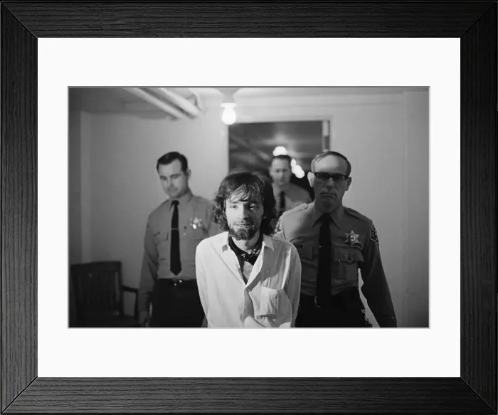 Framed Print : Charles Manson Being Escorted by Police Framed Print : Charles Manson Being Escorted by Police