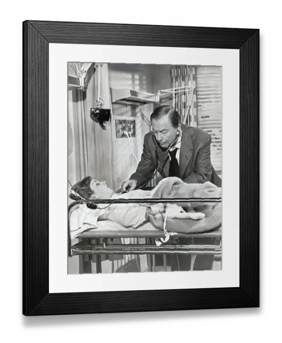 Framed Print : Robert Young Treats Patient as Marcus Welby Framed Print : Robert Young Treats Patient as Marcus Welby