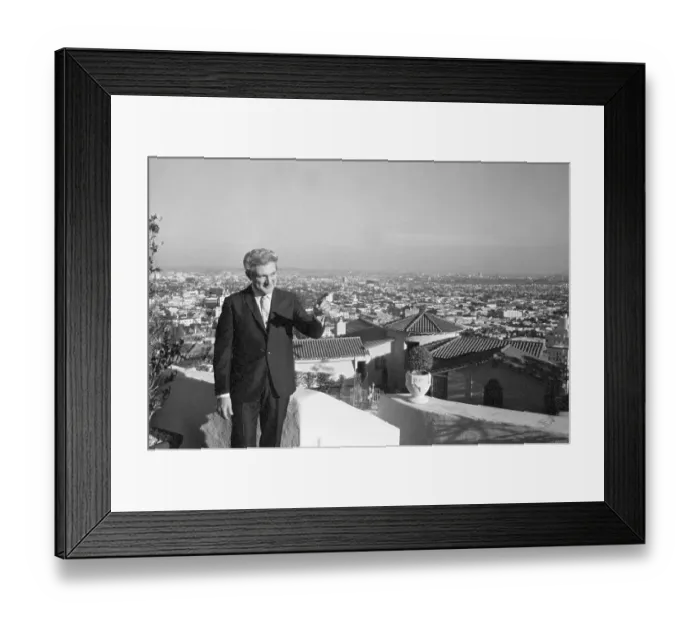 Framed Print : Liberace steps out the front door at his home Framed Print : Liberace steps out the front door at his home