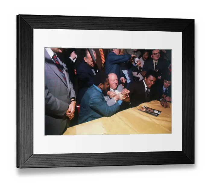 Framed Print : Muhammad Ali Clenching Fists with Joe Frazier