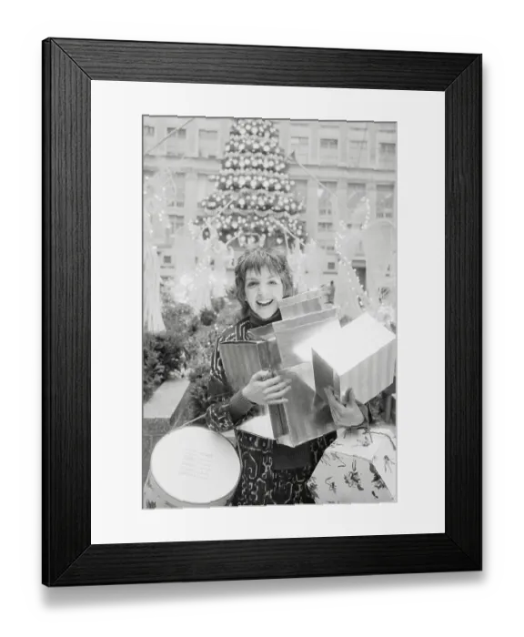 Framed Print : Liza Minnelli Holding Christmas Packages Framed Print : Liza Minnelli Holding Christmas Packages