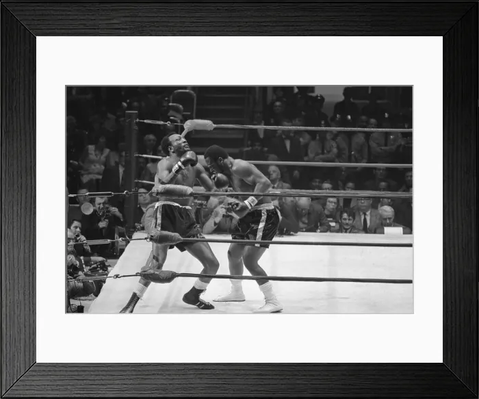 Framed Print : Frazier Slams Foster