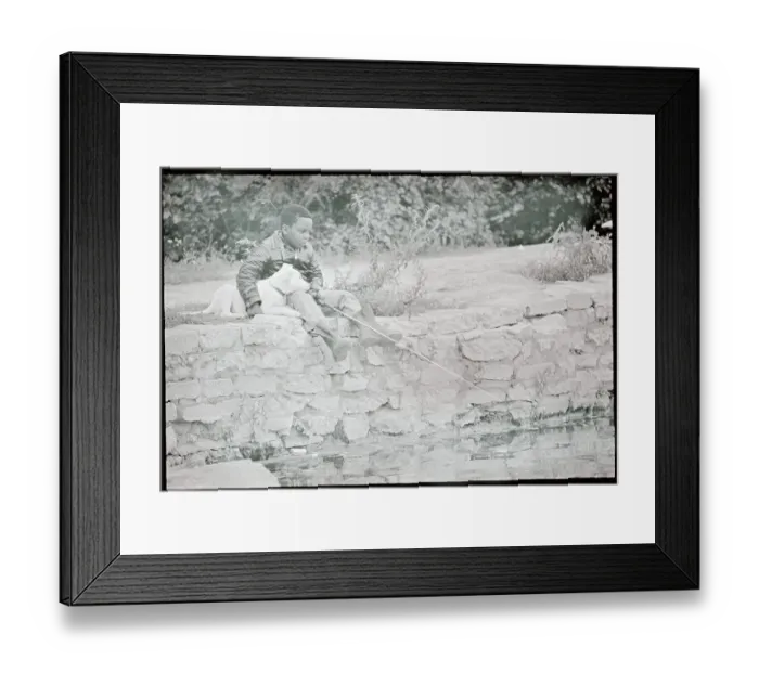 Framed Print : Boy Sitting on Bank Fishing Framed Print : Boy Sitting on Bank Fishing