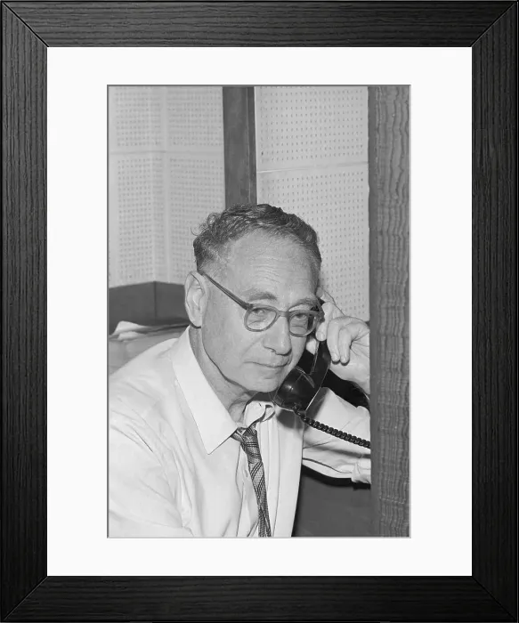 Framed Print : Bernard Katz Holding Telephone Receiver for Call to His Wife Framed Print : Bernard Katz Holding Telephone Receiver for Call to His Wife
