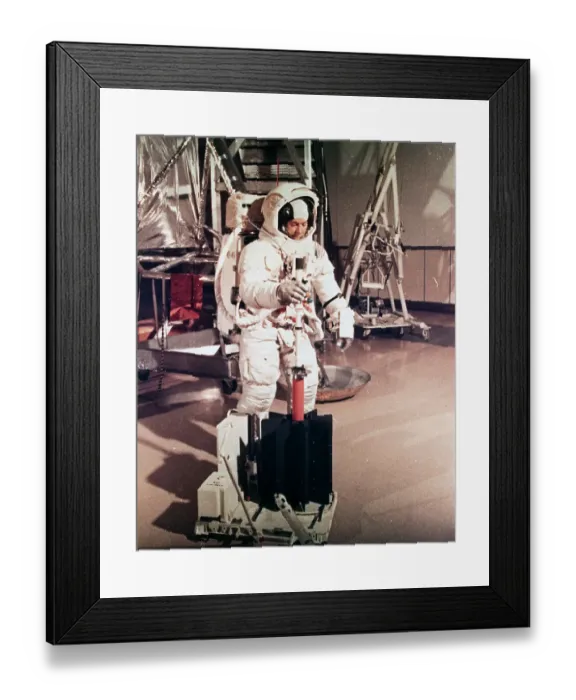 Framed Print : Edgar Mitchell Inserting Fuel Capsule to RTG Framed Print : Edgar Mitchell Inserting Fuel Capsule to RTG