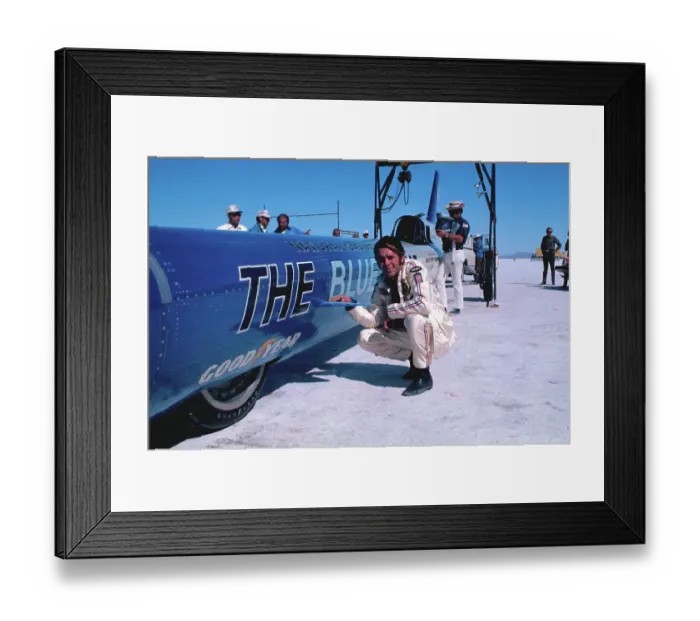 Framed Print : Gary Gabelich Stooping Next to Race Car Framed Print : Gary Gabelich Stooping Next to Race Car