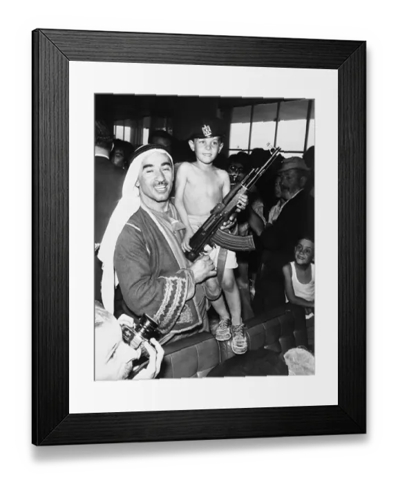 Framed Print : Young Passenger of Hijacked Jet Holding Rifle Framed Print : Young Passenger of Hijacked Jet Holding Rifle