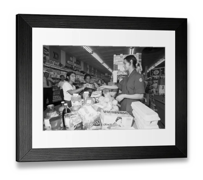 Framed Print : Woman Buying Groceries with Food Stamps Framed Print : Woman Buying Groceries with Food Stamps