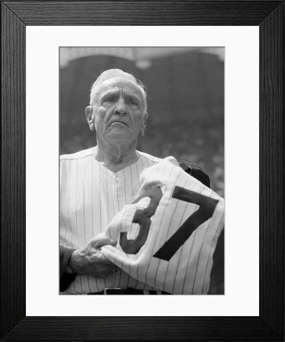 Framed Print : Casey Stengel Holding His Baseball Uniform Framed Print : Casey Stengel Holding His Baseball Uniform