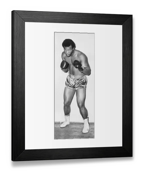 Framed Print : George Foreman Striking a Fighting Pose Framed Print : George Foreman Striking a Fighting Pose