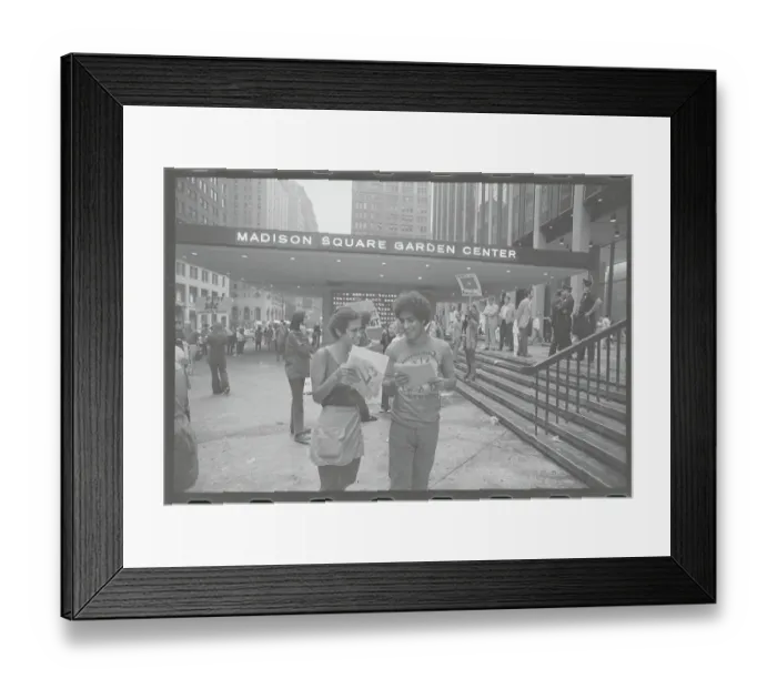Framed Print : Abbie Hoffman Conversing with Young Lady Framed Print : Abbie Hoffman Conversing with Young Lady