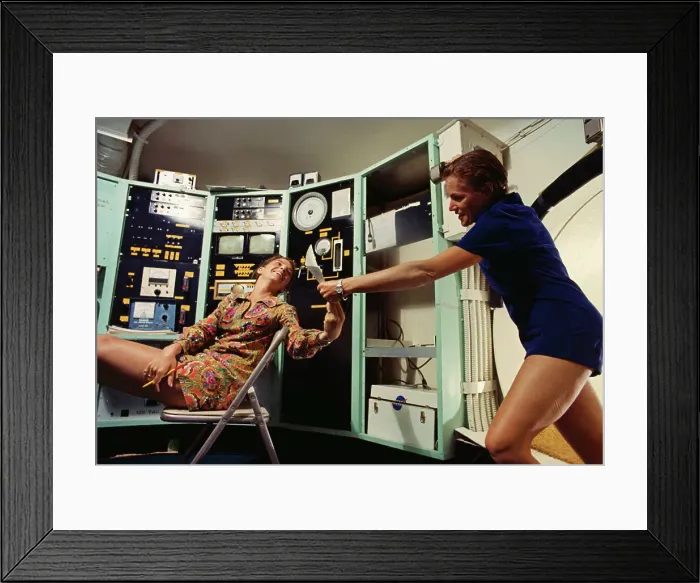 Framed Print : Female Aquanauts Conversing Framed Print : Female Aquanauts Conversing