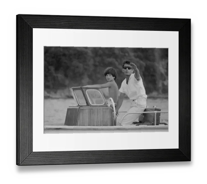 Framed Print : John F Kennedy Jr in Boat with Onassis Bodyguard Framed Print : John F Kennedy Jr in Boat with Onassis Bodyguard