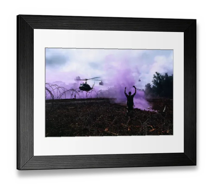 Framed Print : Soldier Guiding Helicopters into Landing Zone, Cambodia 1970