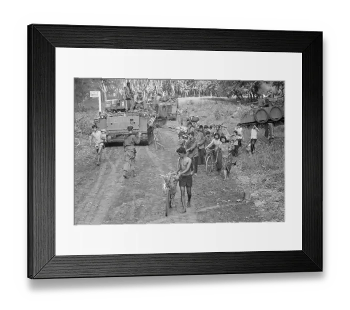 Framed Print : Army Tank & Group Of Cambodian Refugees Framed Print : Army Tank & Group Of Cambodian Refugees