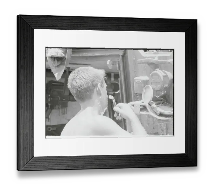 Framed Print : Young Soldier Shaving