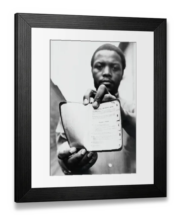 Framed Print : Black African Man Holding Pass-Book Framed Print : Black African Man Holding Pass-Book
