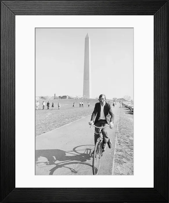 Framed Print : Bicyclist Wearing Gas Mask on Earth Day Framed Print : Bicyclist Wearing Gas Mask on Earth Day