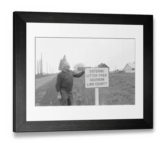 Framed Print : Farmer Stands Next To Sign; Litter-Free Framed Print : Farmer Stands Next To Sign; Litter-Free