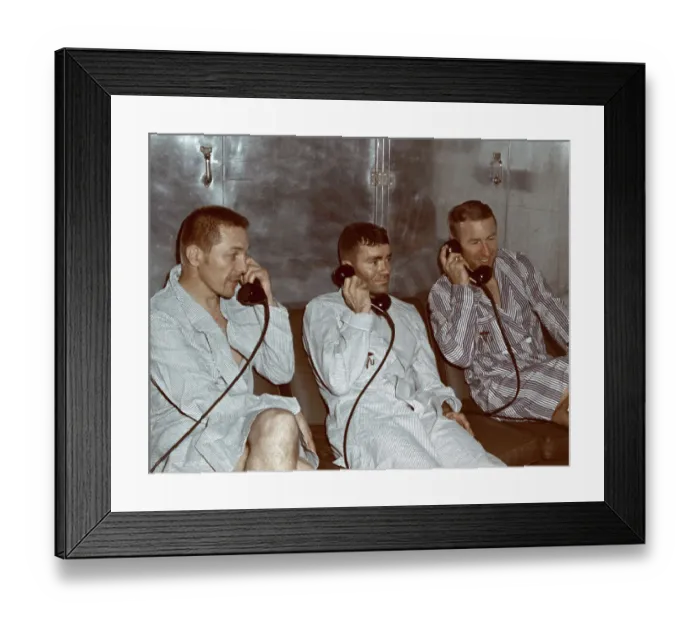 Framed Print : Apollo 13 Astronauts Talking on the Phone