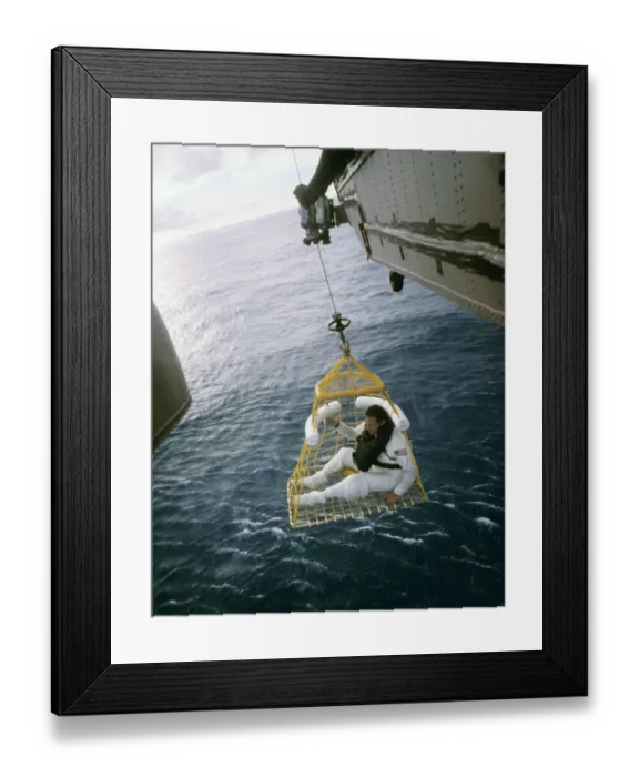 Framed Print : John Swigert Riding in a Rescue Basket Framed Print : John Swigert Riding in a Rescue Basket