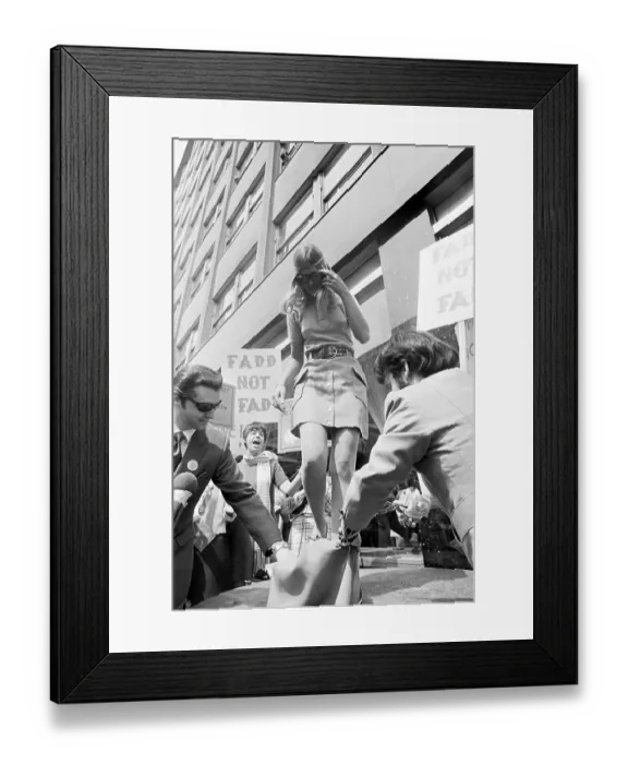 Framed Print : Fashion Protesters Cutting Dress, Mini-Skirt Framed Print : Fashion Protesters Cutting Dress, Mini-Skirt