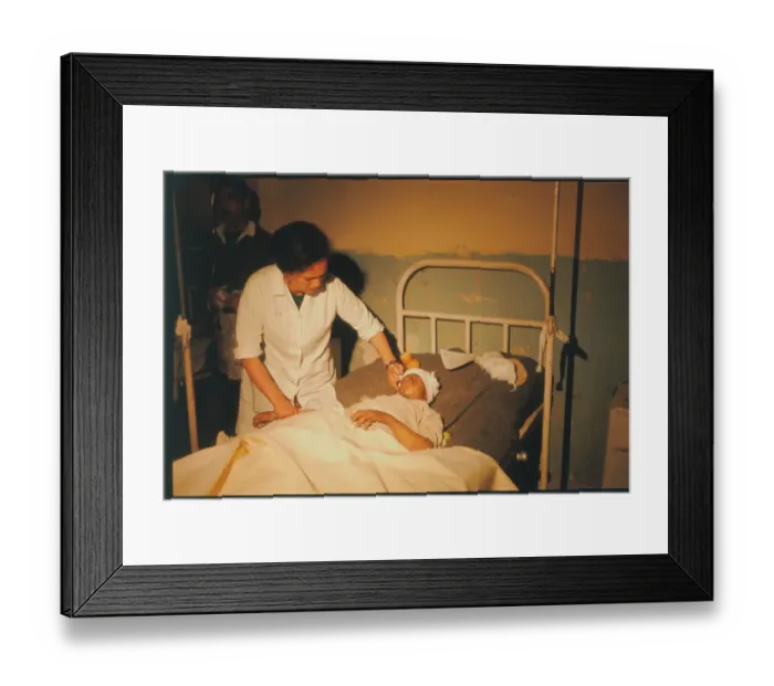 Framed Print : Nurse with Injured Egyptian Child Framed Print : Nurse with Injured Egyptian Child