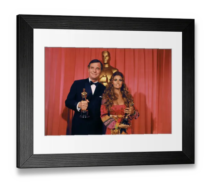 Framed Print : Gig Young and Raquel Welch Holding Awards Framed Print : Gig Young and Raquel Welch Holding Awards