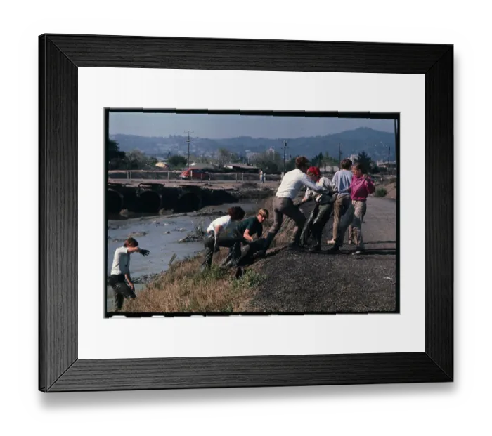 Framed Print : Workers Pull Tires From Mud Flats Framed Print : Workers Pull Tires From Mud Flats