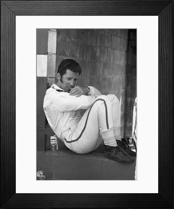 Framed Print : Mario Andretti Sitting in Crouched Position