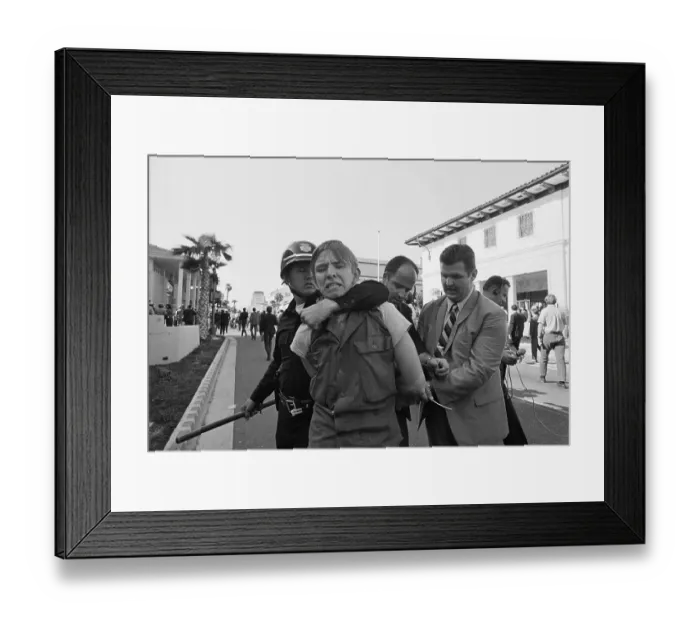 Framed Print : Police Restraining a Demonstrator Framed Print : Police Restraining a Demonstrator