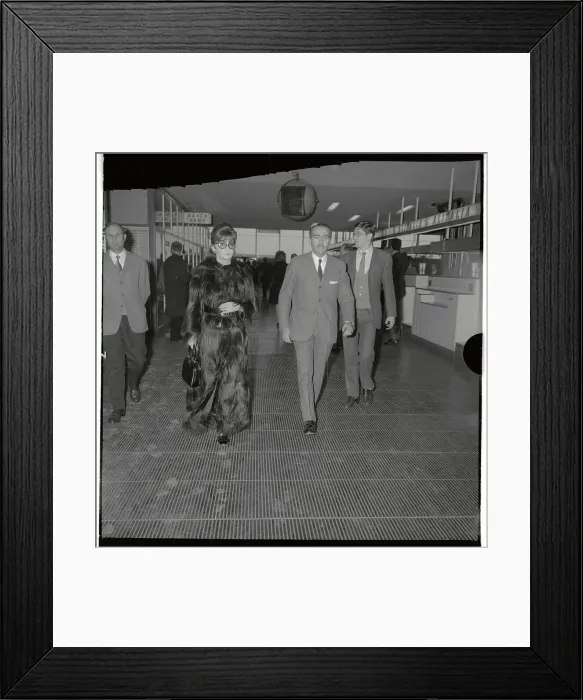 Framed Print : Gina Lollobrigida Walking Inside Airport