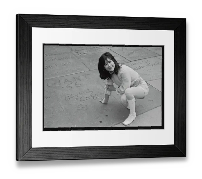 Framed Print : Actress Tsai Chin Stooping and Examining Prints on Hollywood Sidewalk Framed Print : Actress Tsai Chin Stooping and Examining Prints on Hollywood Sidewalk