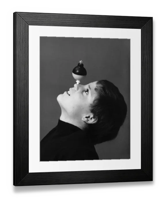 Framed Print : Boy with Toy Spinning on Nose Framed Print : Boy with Toy Spinning on Nose