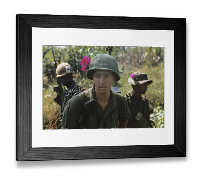 Framed Print : US Soldier Wearing Pink Flower on Helmet Framed Print : US Soldier Wearing Pink Flower on Helmet
