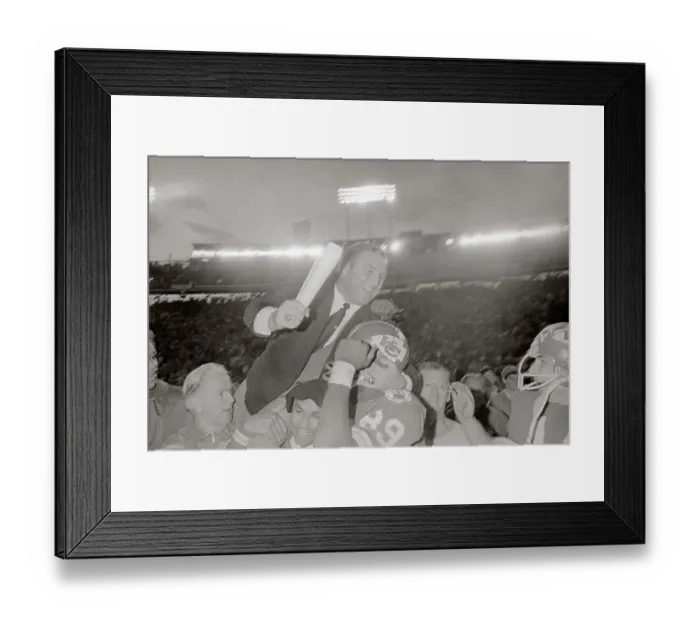 Framed Print : Hank Stram Being Carried on Top of Otis Taylor Framed Print : Hank Stram Being Carried on Top of Otis Taylor