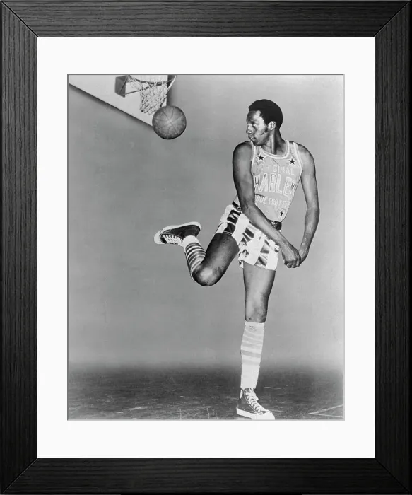 Framed Print : Meadowlark Lemon Throwing Basketball Backwards into Basket
